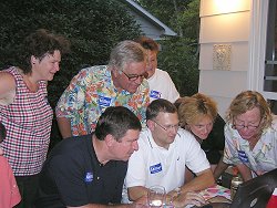 Steve Miller Camp watches election results come in at Miller's home on Tuesday evening.